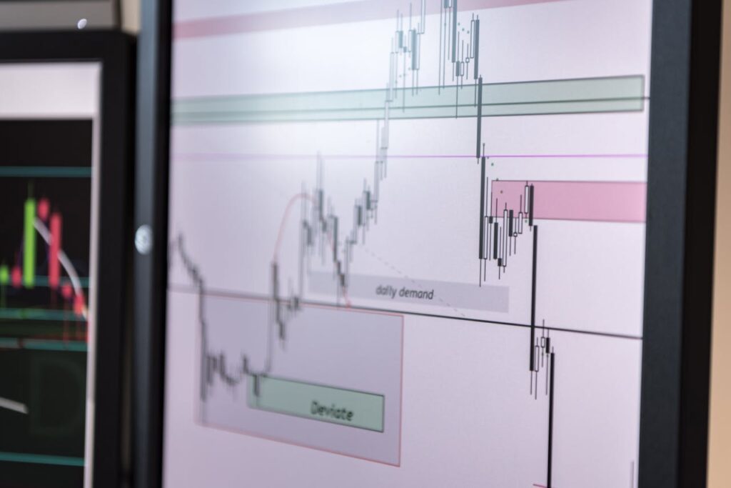 pexels-photo-5831512-1 Detailed view of a trading chart analyzing cryptocurrency trends and market data.